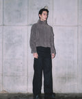Zaire Jacket de MateriaCruda, cuello alto estructurado y cierre frontal oculto