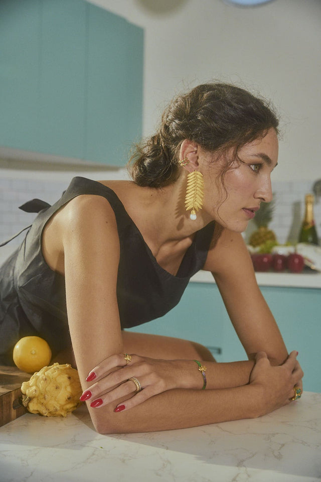 PINO ROMERON AND PEARL EARRINGS