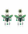 Vuelo earrings by Mercedes Salazar hand-embroidered in thread with semi-precious stones and gold-plated bronze details