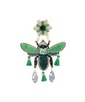 Detail of the Vuelo earrings by Mercedes Salazar embroidered in thread with semi-precious stones